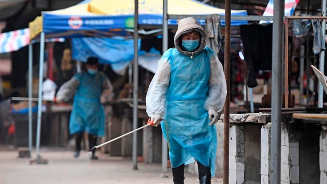 Novas infecções por novo coronavírus caem pelo 14º dia consecutivo fora de Hubei
