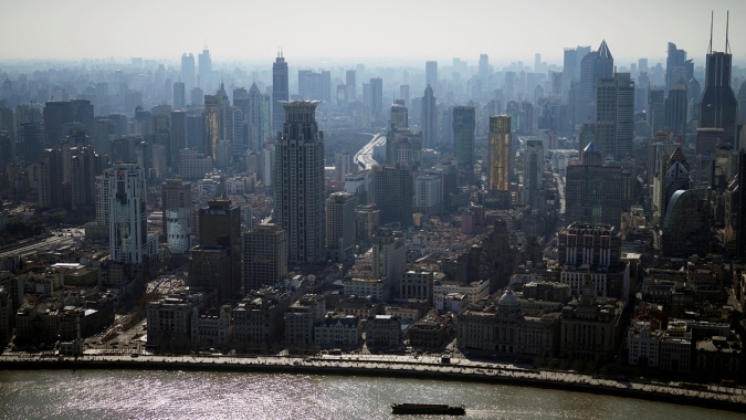 China corta a taxa de empréstimo mais do que o esperado para reanimar o setor habitacional