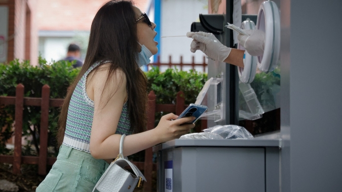 Grupo consultivo da OMS pede dados "realistas" da China sobre Covid
