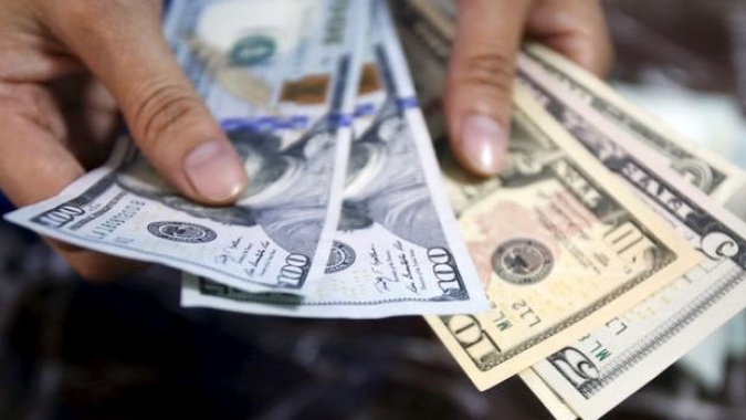 Dólar perde força no começo da tarde atento a exterior