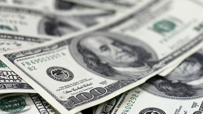 Dólar fecha estável no Brasil com guerra ainda no foco