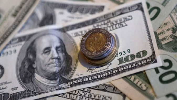 Dólar oscila perto da estabilidade no Brasil com Irã e EUA próximos de um acordo