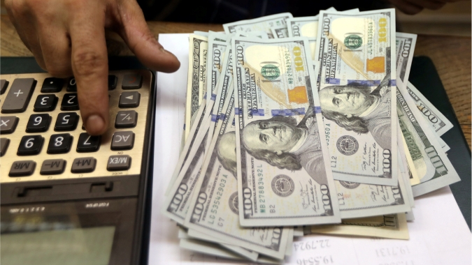 Dólar acompanha exterior e perde fôlego após superar R$5,19