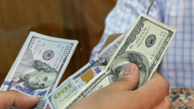 Dólar cai no Brasil em meio ao recuo no exterior e ao avanço do Ibovespa