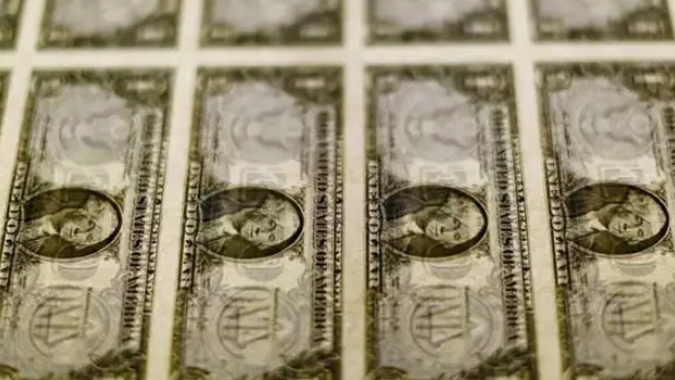 Dólar tem sessão instável ante real após dados de inflação dos EUA